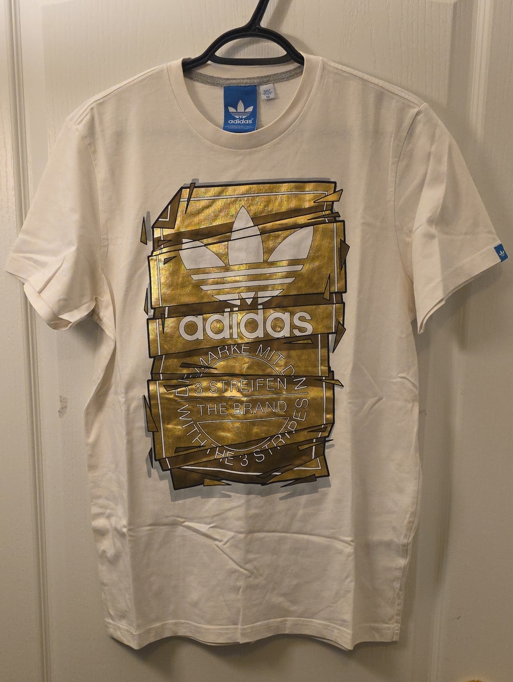 adidas Men’s Cream Tee with Metallic Gold Trefoil Graphic